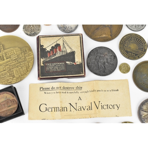 116 - A collection of assorted commemorative medals to include a medal commemorating the opening of St Nic... 