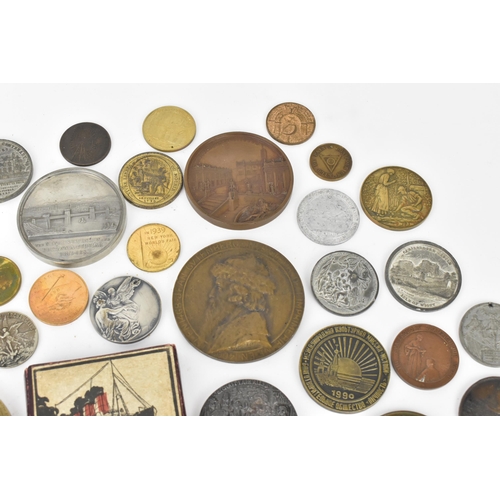 116 - A collection of assorted commemorative medals to include a medal commemorating the opening of St Nic... 