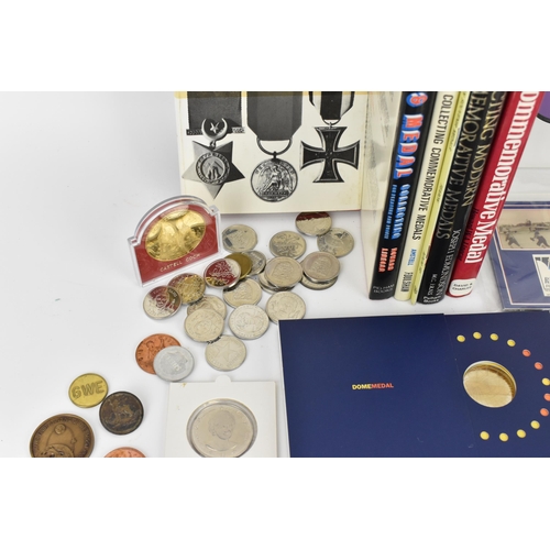 117 - A collection of commemorative coins to include 1814 Tsar Alexander of Russia coin to commemorate the... 