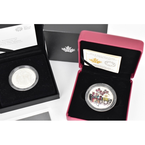 121 - A collection of Queen Elizabeth II and Royal related commemorative coins to include the Royal Canadi... 