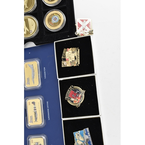 123 - A collection of Royal Mint and other commemorative coins of WWII and RAF interest to include the 24c... 