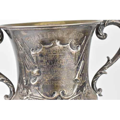 143 - A British Army Regimental Challenge Cup, Twin handled Silver trophy, hallmarks London 1860.  The emb... 