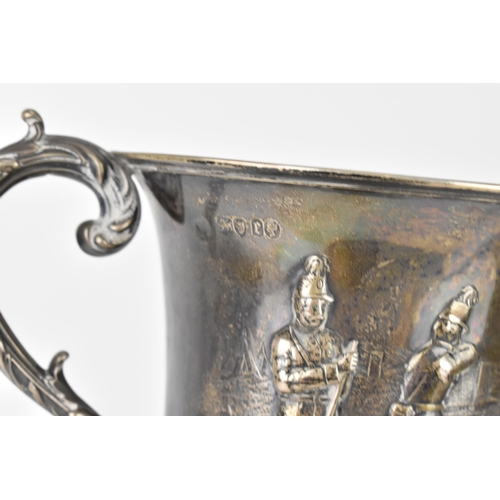 143 - A British Army Regimental Challenge Cup, Twin handled Silver trophy, hallmarks London 1860.  The emb... 