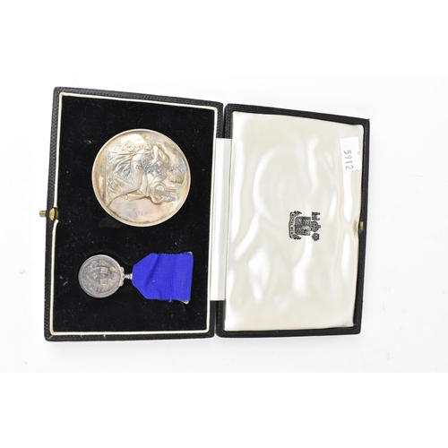 145 - The Worshipful Company of Musicians presentation medal and miniature on blue ribbon, awarded to ALBE... 