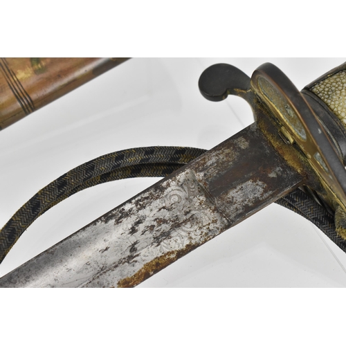 158 - An 1827 pattern Royal Navy Officers sword and scabbard having lion head pommel and folding guard, wi... 