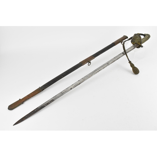 158 - An 1827 pattern Royal Navy Officers sword and scabbard having lion head pommel and folding guard, wi... 