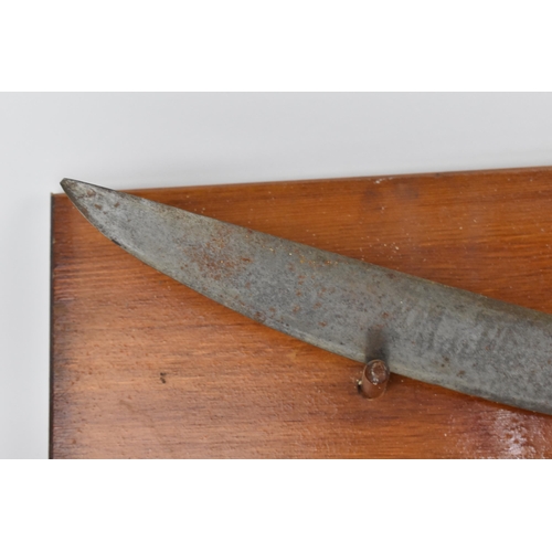 160 - An early 19th century Indian Tulwar having a 70cm curved, single edge blade, steel decorated cross g... 