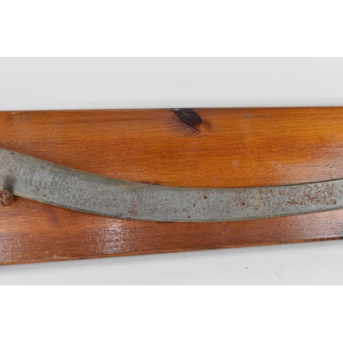 160 - An early 19th century Indian Tulwar having a 70cm curved, single edge blade, steel decorated cross g... 