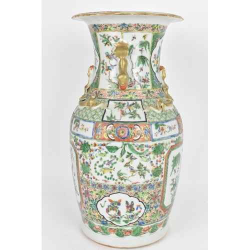 77 - A Chinese Export Famille Rose porcelain baluster vase, Canton, Late 19th/early 20th century, decorat... 