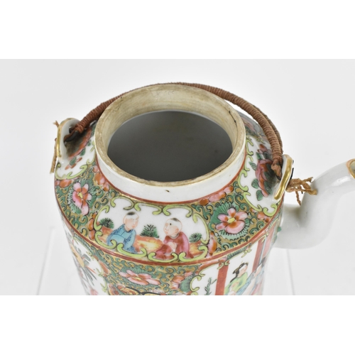 85 - A Chinese export Famille Rose porcelain teapot, Canton, late 19th/early 20th century, decorated with... 