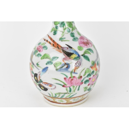 86 - A Chinese Famille Rose porcelain bottle vase, late 19th century, with underglaze blue landscape and ... 