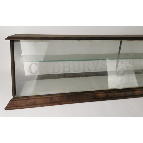 193 - A large early 20th century mahogany advertising counter top display cabinet for Cadbury's chocolate,... 