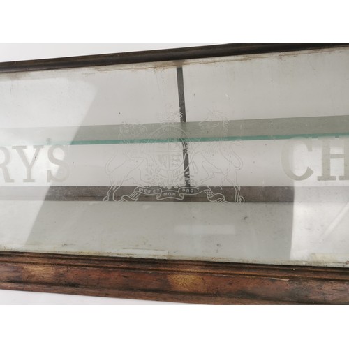 193 - A large early 20th century mahogany advertising counter top display cabinet for Cadbury's chocolate,... 