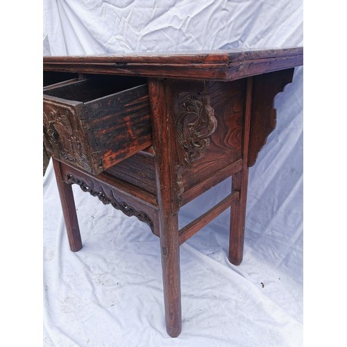 32 - A Chinese late Qing dynasty hardwood altar table, the rectangular top above two central drawers with... 