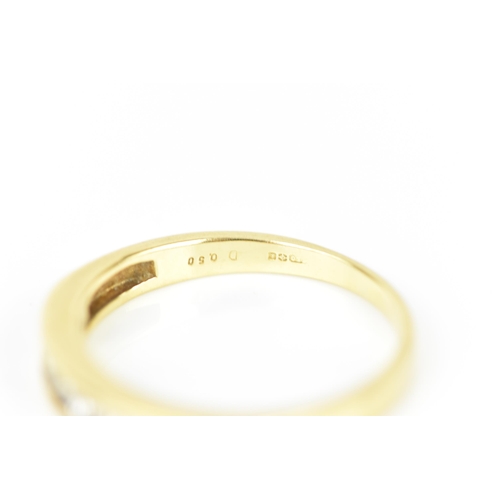 240 - An 18ct yellow gold and diamond half eternity ring, with seven channel set round brilliant cut diamo... 