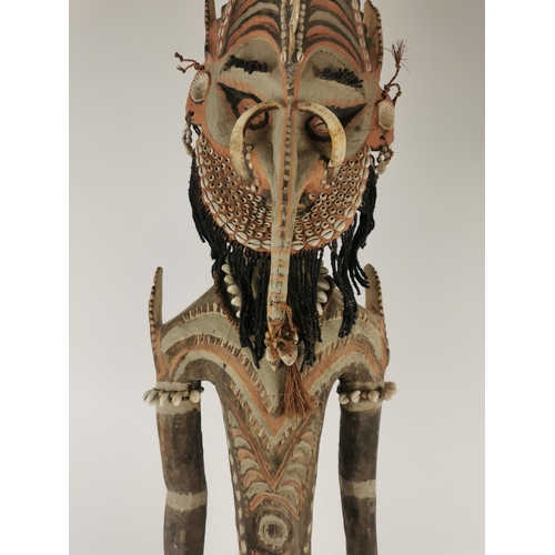 185 - A large tribal Papua New Guinea Iatmul figural wood sculpture, Sepik River, made with boar tusks, ca... 