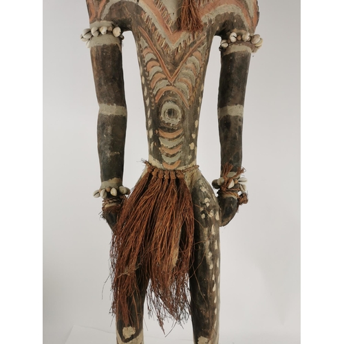 185 - A large tribal Papua New Guinea Iatmul figural wood sculpture, Sepik River, made with boar tusks, ca... 