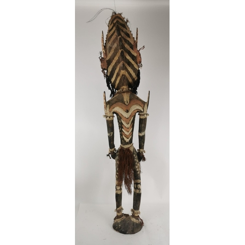 185 - A large tribal Papua New Guinea Iatmul figural wood sculpture, Sepik River, made with boar tusks, ca... 