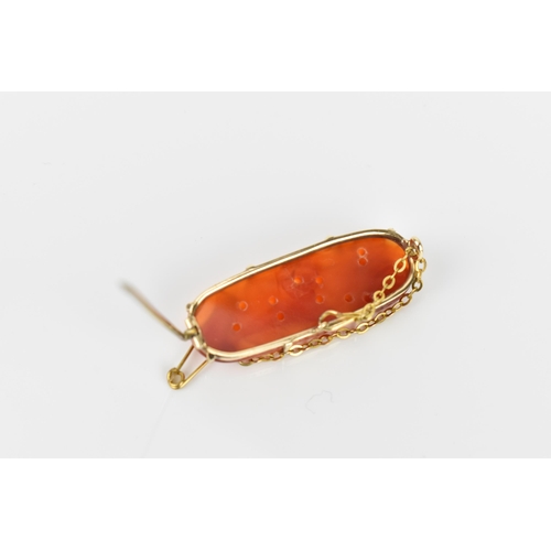 54 - A 9ct yellow gold mounted Chinese agate brooch, pierced and carved with fruit and foliage, with safe... 