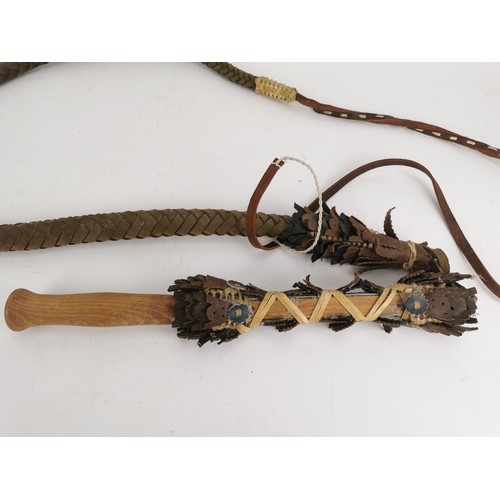 74 - An Oriental martial arts wood and braided leather shaolin whip