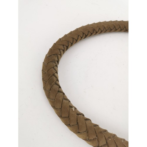 74 - An Oriental martial arts wood and braided leather shaolin whip