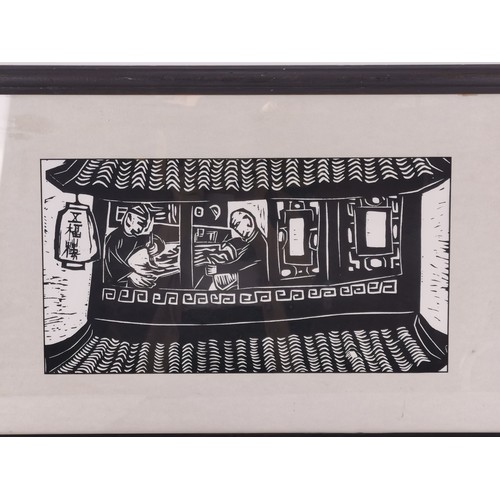 71 - A 20th century Chinese woodblock print, in black ink depicting artisans painting in a pagoda style b... 