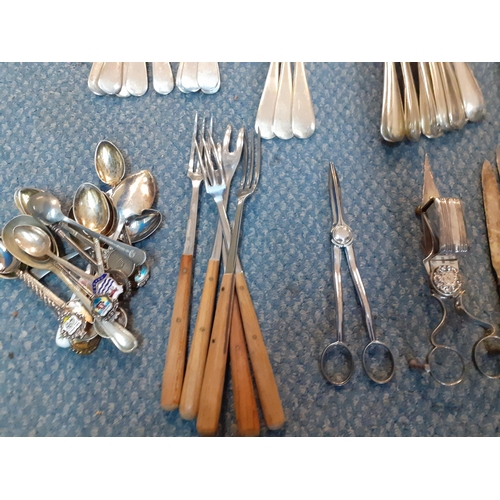 192 - Mixed silver plated cutlery and flatware to include Elkington, two pairs  of grape scissors and othe... 