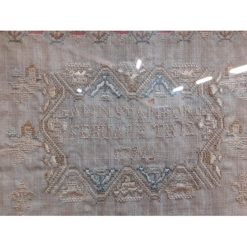 193 - A 1796 sampler worked by Ann Stanford on February 12th, stretched in a black frame, Location RWF