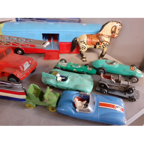 90 - A quantity of diecast vehicles to include Chipperfield Circus and Dinky vehicles together with an MG... 