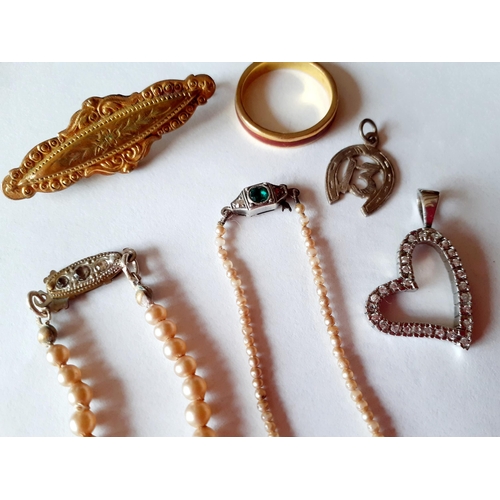 35 - A small quantity of costume jewellery to include silver items, faux vintage pearls and a Timex indig... 