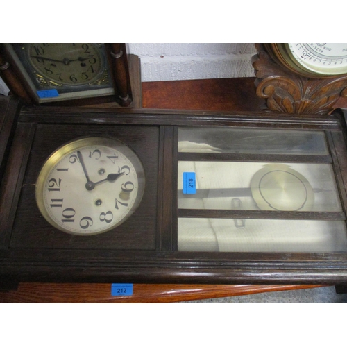 227 - An early 20th century oak cased German mantel clock and a Victorian oak cased barometer and an oak c... 