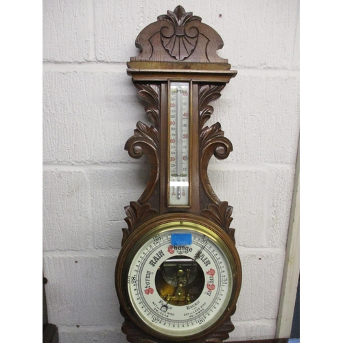 227 - An early 20th century oak cased German mantel clock and a Victorian oak cased barometer and an oak c... 