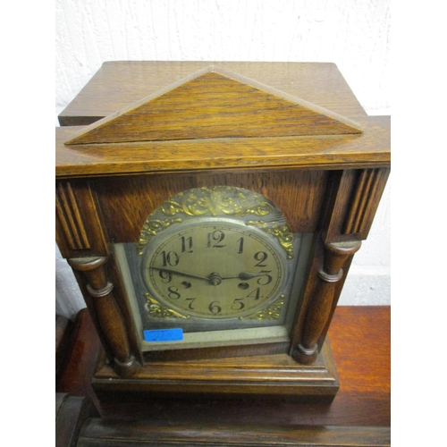 227 - An early 20th century oak cased German mantel clock and a Victorian oak cased barometer and an oak c... 