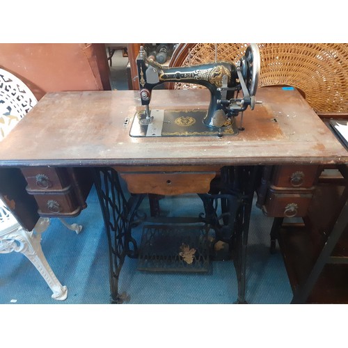 229 - A small vintage table top sewing machine A/F, and a collectors doll A/F, together with a vintage Roy... 