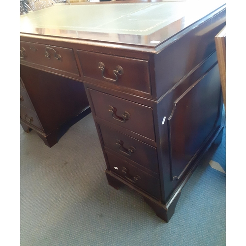 200 - A reproduction mahogany twin pedestal desk with green leather scriber 75cm h x 120cm w x 60cm 
Locat... 