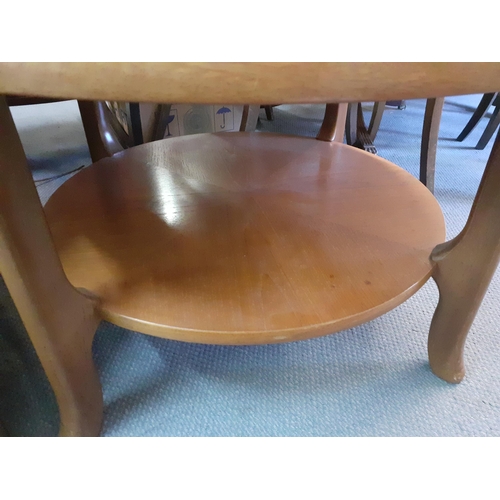 202 - A retro teak circular coffee table with shelf below 50cm h x 86cm d Condition: Some stains to top - ... 