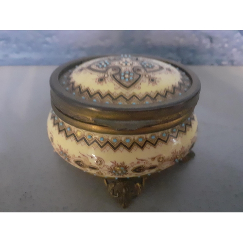 217 - A 19th Century French porcelain decorated and footed trinket box with fitted interior, together with... 