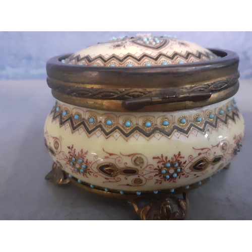 217 - A 19th Century French porcelain decorated and footed trinket box with fitted interior, together with... 