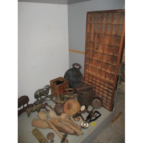 148 - A mixed lot of kitchenalia and other household implements to include a matched pair of cast iron man... 