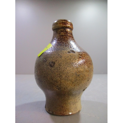 175 - A small salt glaze stoneware bottle, probably early 18th century, impressed with the number 4 to one... 