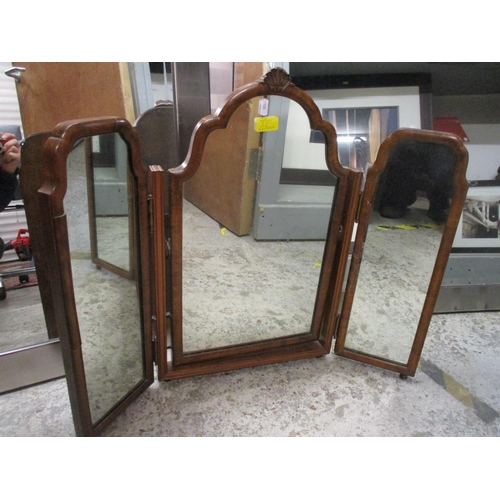 22 - Two modern silver framed mirrors and a walnut triptych mirror
Location: ROS