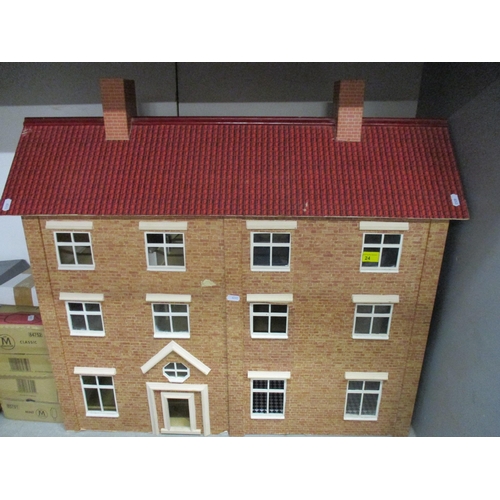 24 - A dolls house with a double front and various dolls house furniture. Location:G