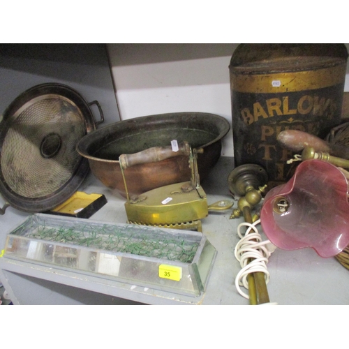 35 - A mixed lot of household items to include Barlow's Pure Tea Tole ware tea canister, a large copper b... 