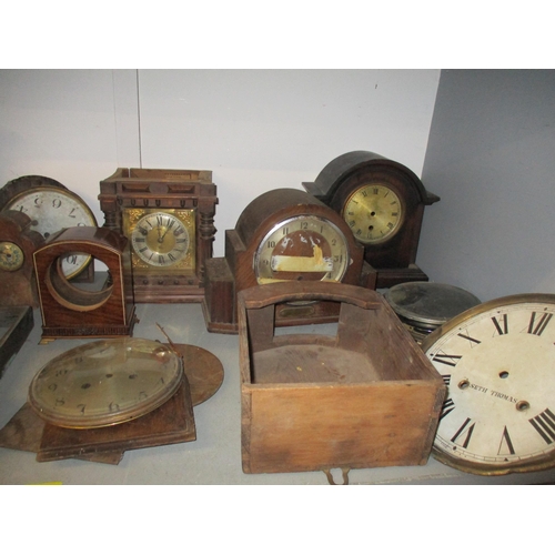 49 - A quantity of Victorian and later clock cases, parts and other accessories to include mantle clocks ... 