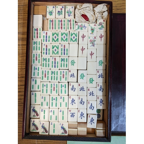 133 - A Mahjong set with counters in a wood case
Location: 5.1