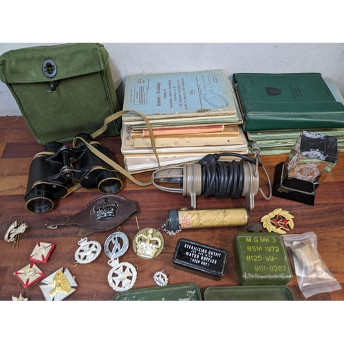 182 - Military related items to include a Kershaw Bino Prisum binoculars, Northern Ireland Operational Aid... 