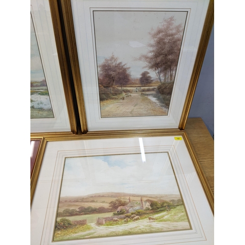 197 - George Oyston - a landscape with a hill, two landscapes with rivers, watercolours, each framed and g... 