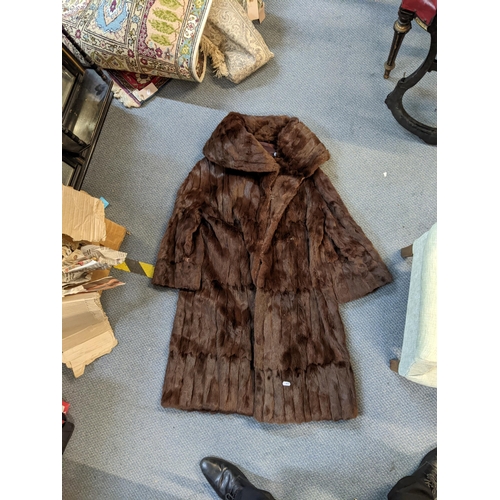 282 - Three fir coats to include two brown examples and a cream coat
Location: FSR