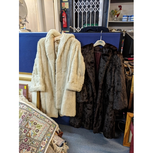 282 - Three fir coats to include two brown examples and a cream coat
Location: FSR