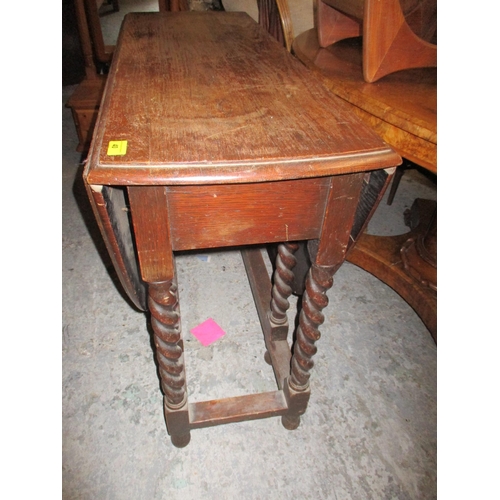 40 - Two of a nest of retro G-plan occasional table, and an oak gate leg barley twist table, 74.5cm x 106... 